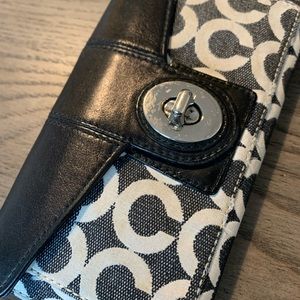 Coach wallet. Black and white exterior. Light blue interior.